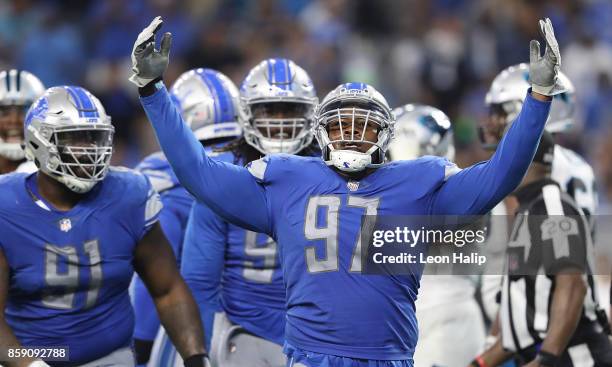 Armonty Bryant celebrates a fourth down stop against the Carolina Panthers at Ford Field on October 8, 2017 in Detroit, Michigan. Carolina defeated...