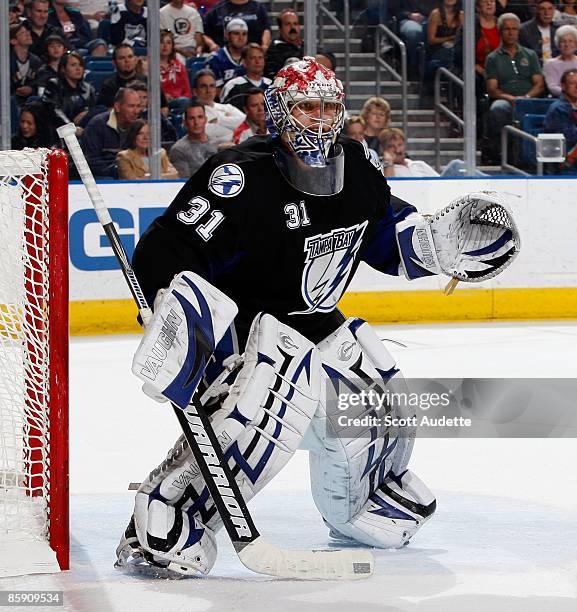 Goaltender Karri Ramo of the Tampa Bay Lightning defends the goal against the Washington Capitals at the St. Pete Times Forum on April 9, 2009 in...