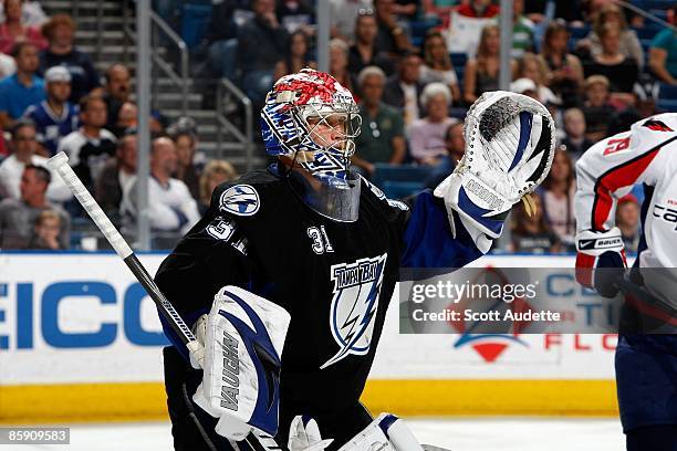 Goaltender Karri Ramo of the Tampa Bay Lightning defends the goal against the Washington Capitals at the St. Pete Times Forum on April 9, 2009 in...