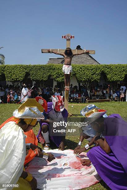 Group of actors perform the Via Crucis in the municipality of Livingston, Izabal, some 300 km north of Guatemala City, on April 10, 2009. Christians...