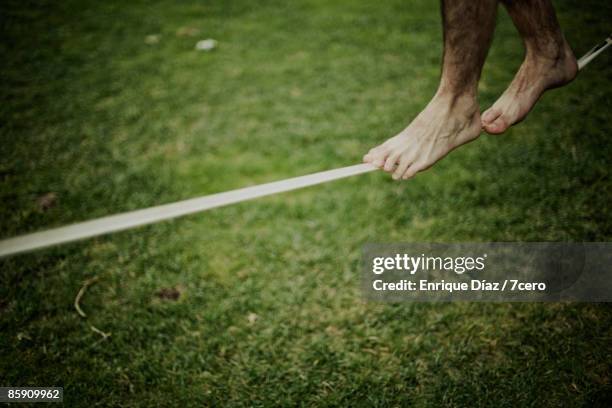 People Using Toe Rope Man Walking On Rope Photos and Premium High Res Pictures - Getty Images