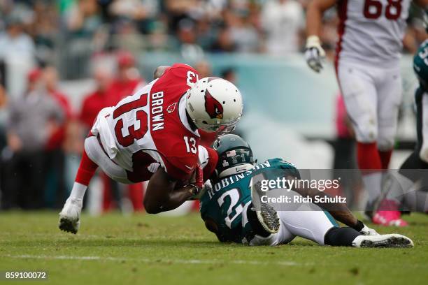 Jaron Brown of the Arizona Cardinals attempts an incomplete pass against Patrick Robinson of the Philadelphia Eagles during the second half at...