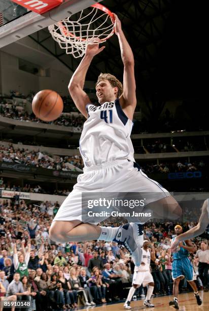 Dirk Nowitzki of the Dallas Mavericks dunks against the New Orleans Hornets on April 10, 2009 at the American Airlines Center in Dallas, Texas. NOTE...