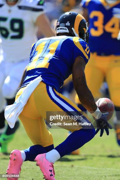 Tavon Austin of the Los Angeles Rams drops the punt return during the first quarter the game against the Seattle Seahawks at the Los Angeles Memorial...