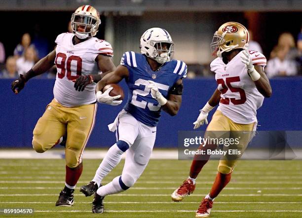 Marlon Mack of the Indianapolis Colts runs the ball downfield for a first down during overtime in the game between the Indianapolis Colts and the San...