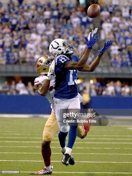 Hilton of the Indianapolis Colts catches a pass for a first down in overtime during the game between the Indianapolis Colts and the San Francisco...