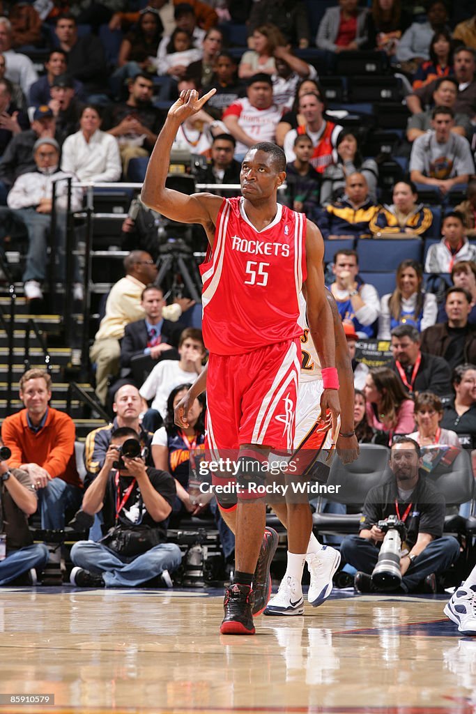 Mutamba Houston Rockets Dikembe Mutombo of the Houston Rockets makes his trademark finger ...