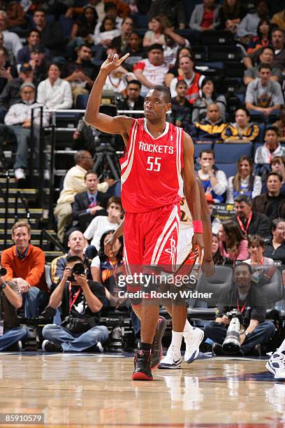 Dikembe Mutombo of the Houston Rockets makes his trademark finger wave after a blocked shot against the Golden State Warriors on April 10, 2009 at...