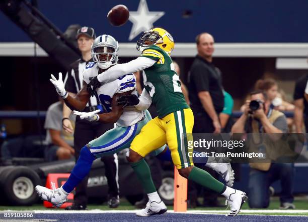 Dez Bryant of the Dallas Cowboys pulls in a touchdown pass to score against Damarious Randall of the Green Bay Packers in the second quarter at AT&T...