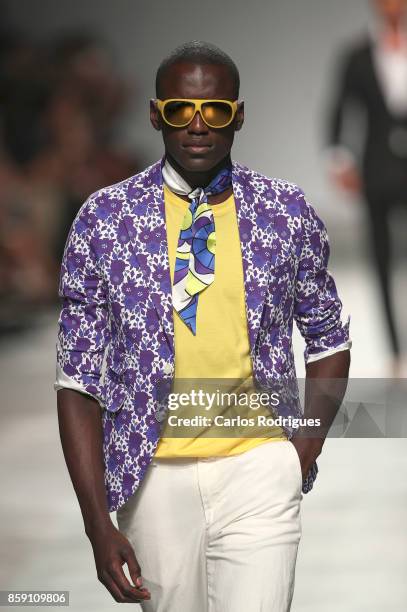 Model walks the catwalk during Mustra runway show on October 8, 2017 in Lisboa CDP, Portugal.