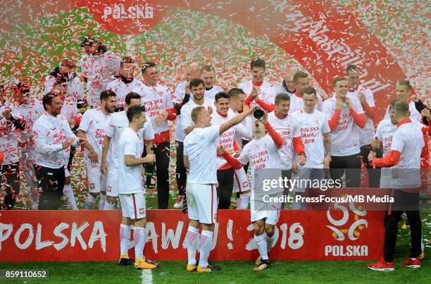 Poland celebrate after qualifying for the 2018 World Cup after the FIFA 2018 World Cup Qualifier between Poland and Montenegro on October 8, 2017 in...