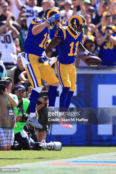 Tavon Austin of the Los Angeles Rams and Cooper Kupp of the Los Angeles Rams celebrate after a touchdown during the game against the Seattle Seahawks...