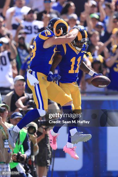 Tavon Austin of the Los Angeles Rams and Cooper Kupp of the Los Angeles Rams celebrate after a touchdown during the game against the Seattle Seahawks...