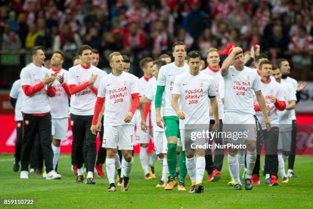 The Polish players celebrate during the FIFA World Cup 2018 Qualifying Round Group E match between Poland and Montenegro at National Stadium in...