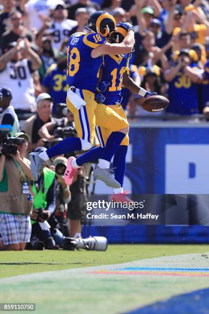 Tavon Austin of the Los Angeles Rams and Cooper Kupp of the Los Angeles Rams celebrate after a touchdown during the game against the Seattle Seahawks...