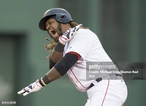 Hanley Ramirez of the Boston Red Sox reacts after a two-run double against the Houston Astros in the seventh inning of game three of the American...