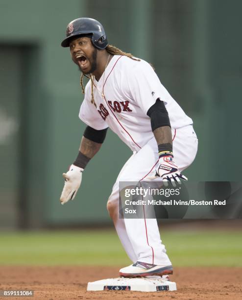 Hanley Ramirez of the Boston Red Sox reacts after a two-run double against the Houston Astros in the seventh inning of game three of the American...