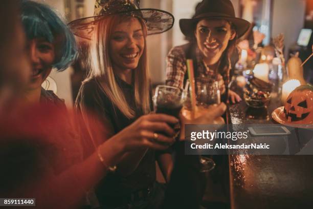 friends on a halloween party - halloween party stock pictures, royalty-free photos & images