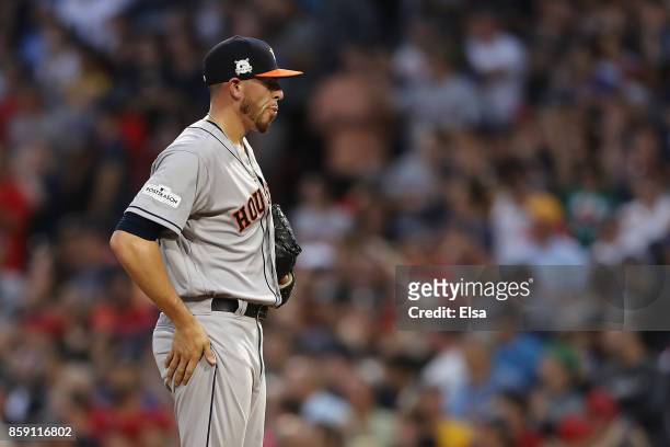 Joe Musgrove of the Houston Astros reacts after a three-run home run by Jackie Bradley Jr. #19 of the Boston Red Sox in the seventh inning during...