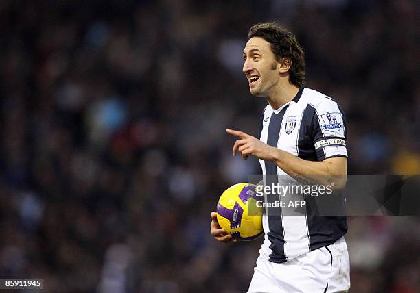 West Bromwich Albion's English player Jonathan Greening in action against Middlesbrough during their Premier League football match at The Hawthorns...