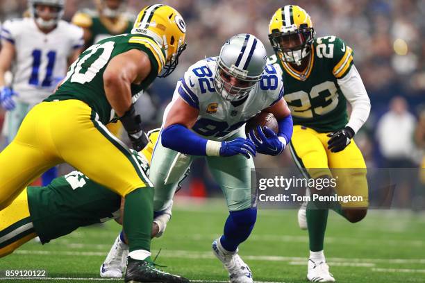 Blake Martinez of the Green Bay Packers, Morgan Burnett of the Green Bay Packers, and Damarious Randall of the Green Bay Packers combine to stop the...