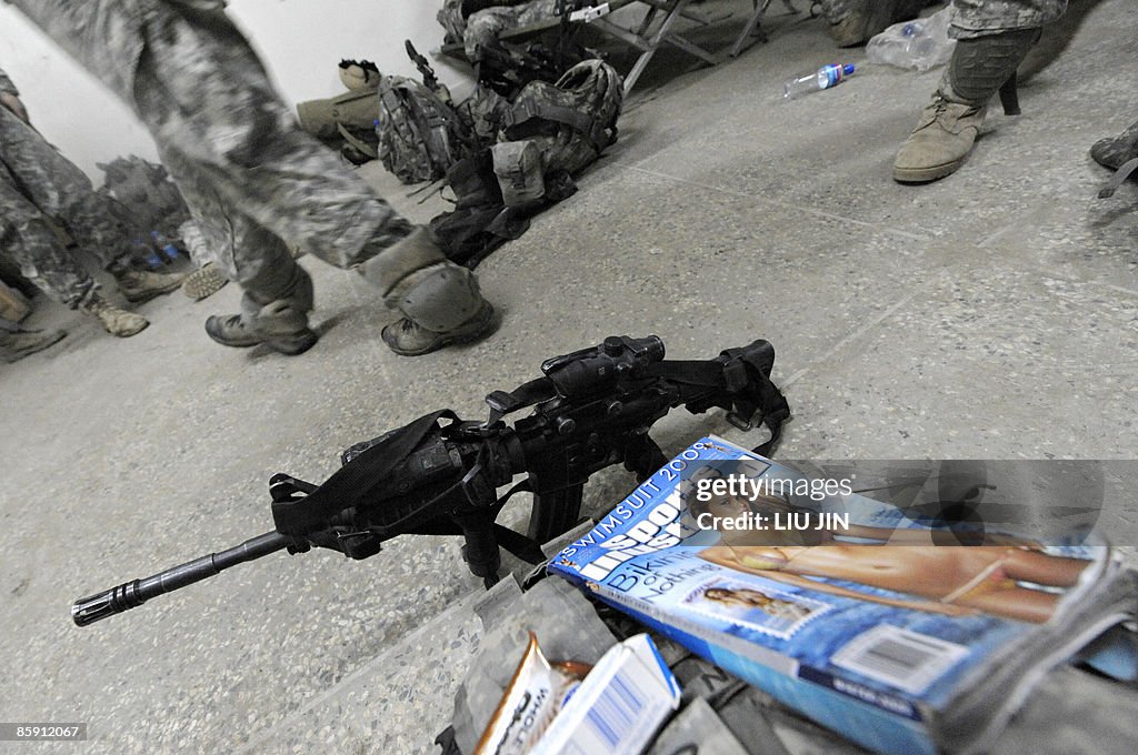 A magazine is seen next to a US soldier'
