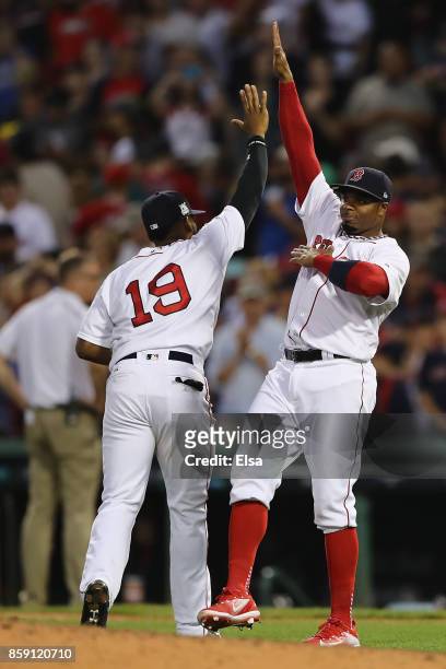 Rajai Davis of the Boston Red Sox celebrates with Jackie Bradley Jr. #19 after defeating the Houston Astros 10-3 in game three of the American League...