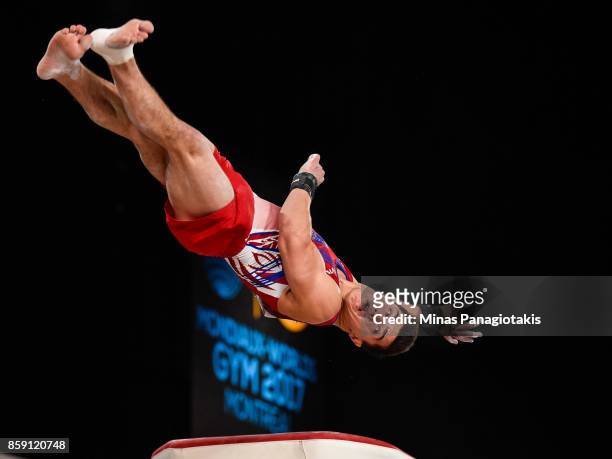 Artur Dalaloyan of Russia competes on the vault during the individual apparatus finals of the Artistic Gymnastics World Championships on October 8,...