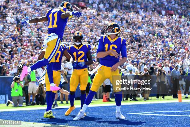 Tavon Austin, Sammy Watkins and Jared Goff of the Los Angeles Rams celebrate after scoring a touchdown during the game against the Seattle Seahawks...
