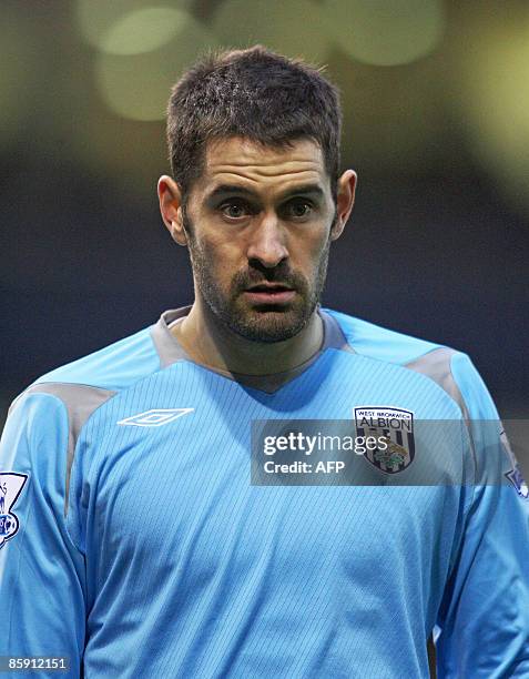 West Bromwich Albion's English goalkeeper Scott Carson in action against Middlesbrough during their Premier League football match at The Hawthorns in...