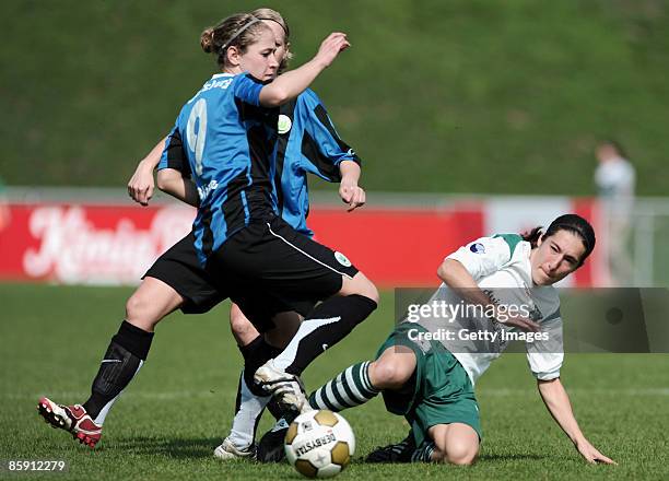 Anna Blaesse of Wolfsburg in action with Annemieke Kiesel of Duisburg during the women DFB Cup football semi final between FCR 2001 Duisburg and VFL...