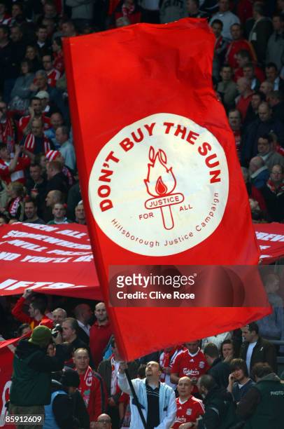 Liverpool fans display banners in reference to the Hillsborough disaster during the Barclays Premier League match between Liverpool and Blackburn at...