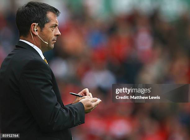 Phil Brown, manager of Hull City makes notes during the Barclays Premier League match between Middlesbrough and Hull City at the Riverside Stadium on...