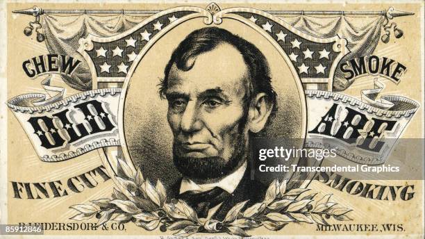 Tobacco trade card produced by Gugler & Sons Lithographic Company, showing a portrait of 'Old Abe' or U.S. President Abraham Lincoln, Milwaukee,...