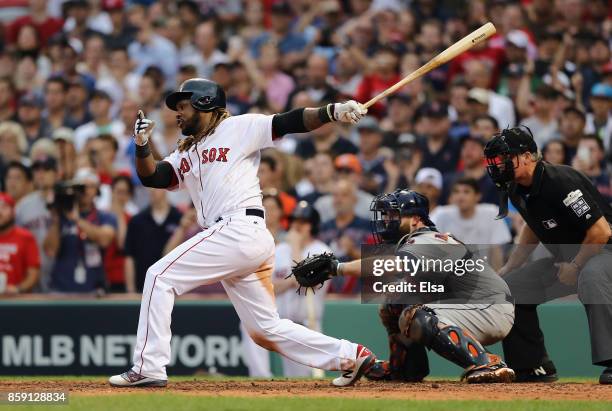 Hanley Ramirez of the Boston Red Sox hits a two-run RBI double in the seventh inning against the Houston Astros during game three of the American...