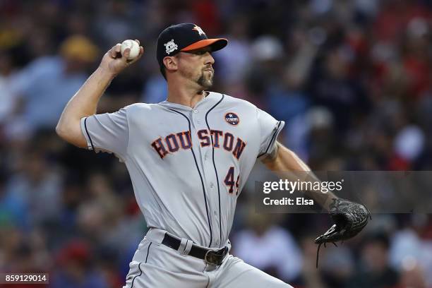 Luke Gregerson of the Houston Astros throws a pitch in the eighth inning against the Boston Red Sox during game three of the American League Division...