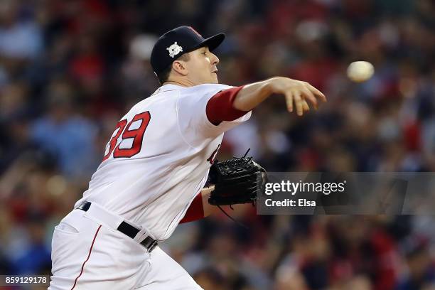 Carson Smith of the Boston Red Sox throws a pitch in the ninth inning against the Houston Astros during game three of the American League Division...