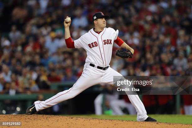 Carson Smith of the Boston Red Sox throws a pitch in the ninth inning against the Houston Astros during game three of the American League Division...