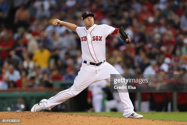 Addison Reed of the Boston Red Sox throws a pitch in the eighth inning against the Houston Astros during game three of the American League Division...