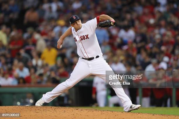 Addison Reed of the Boston Red Sox throws a pitch in the eighth inning against the Houston Astros during game three of the American League Division...
