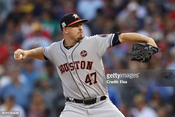 Chris Devenski of the Houston Astros throws a pitch during game three of the American League Division Series between the Houston Astros and the...