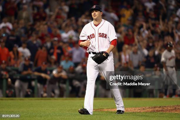 Carson Smith of the Boston Red Sox reacts after the final out against the Houston Astros during game three of the American League Division Series at...