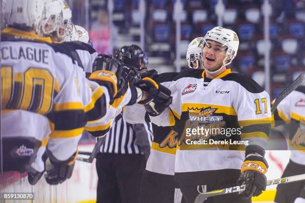 Gunnar Wegleitner of the Brandon Wheat Kings celebrates after scoring against the Calgary Hitmen during a WHL game at the Scotiabank Saddledome on...