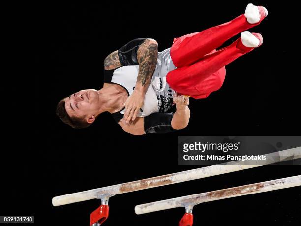 Marcel Nguyen of Germany competes on the parallel bars during the individual apparatus finals of the Artistic Gymnastics World Championships on...