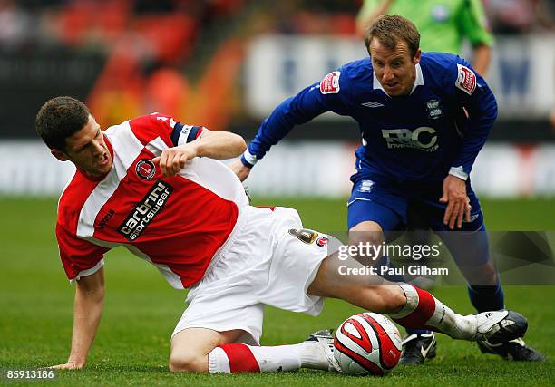 Lee Bowyer of Birmingham City battles for the ball with Mark Hudson of Charlton Athletic during the Coca-Cola Championship match between Charlton...