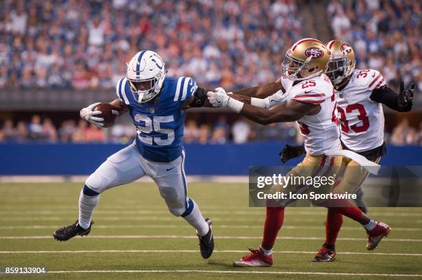 Indianapolis Colts running back Marlon Mack gets by San Francisco 49ers defensive back Jimmie Ward during the NFL game between the San Francisco...