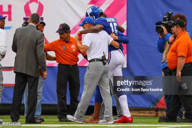New York Giants wide receiver Brandon Marshall is injured during the National Football League game between the New York Giants and the Los Angeles...