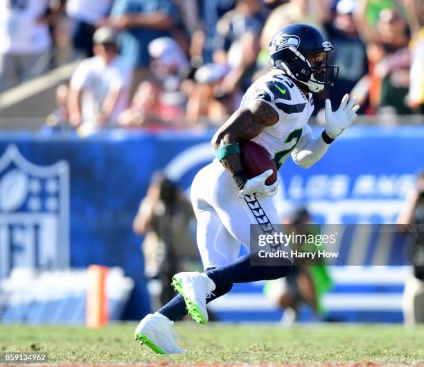 Earl Thomas of the Seattle Seahawks runs back his interception during the fourth quarter in a 16-10 Seahawks win over the Los Angeles Rams at Los...