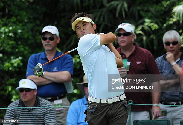 Ryuji Imada of Japan tees off on the fourteenth hole during the third round of the US Masters at the Augusta National Golf Club on April 11, 2009....