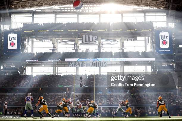 Dak Prescott of the Dallas Cowboys passes the ball to an open receiver against the Green Bay Packers in the third quarter at AT&T Stadium on October...